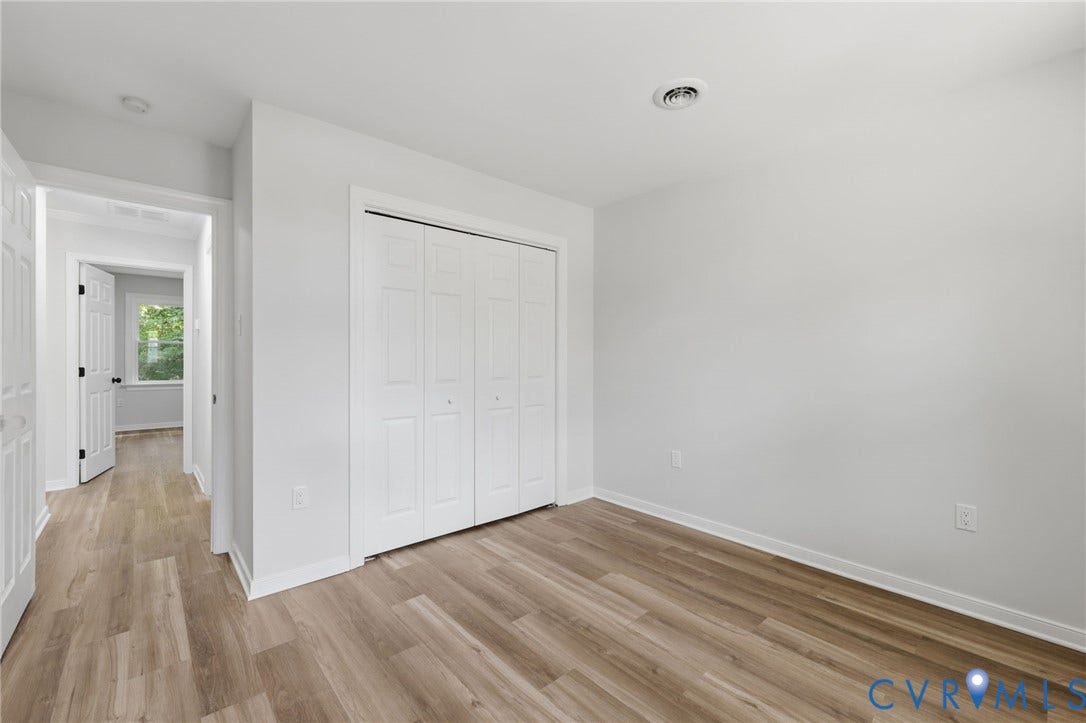 3457 Richards Run, Very Desirable!, Powhatan, VA 23139 Spacious room featuring wood-finish flooring and a bi-fold closet