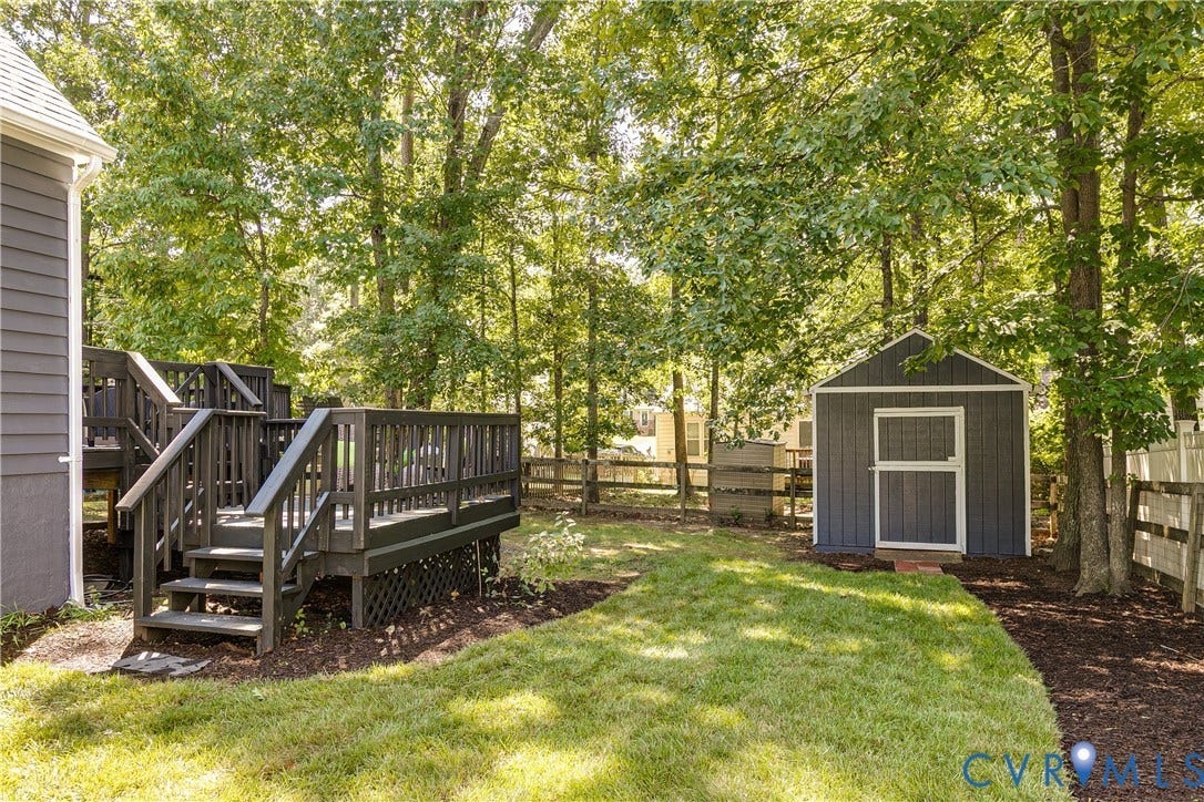 2825 Ashley Glen Drive, Henrico, VA 23233 Fresh sod and landscaping with detached shed.