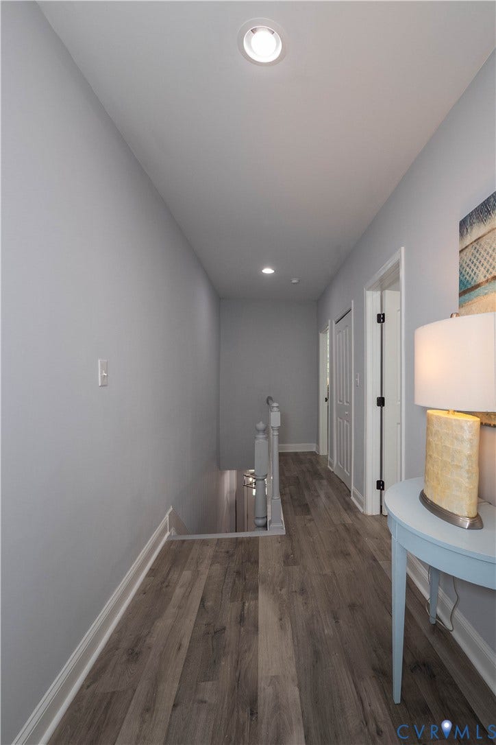1209 N 22nd Street, Church Hill, Richmond, VA 23223 Hallway featuring wood-finish flooring, recessed lighting, light gray wall paint, white baseboards, and white doors