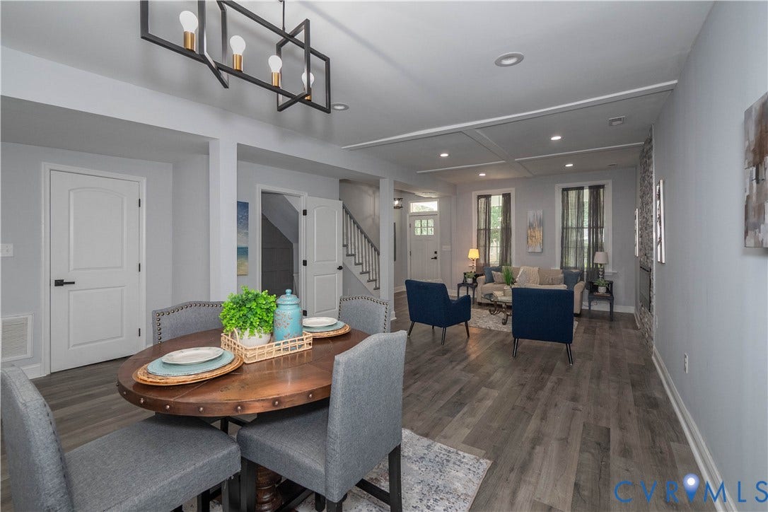 1209 N 22nd Street, Church Hill, Richmond, VA 23223 Open-concept living space featuring wood-finish flooring, recessed lighting, and a modern chandelier