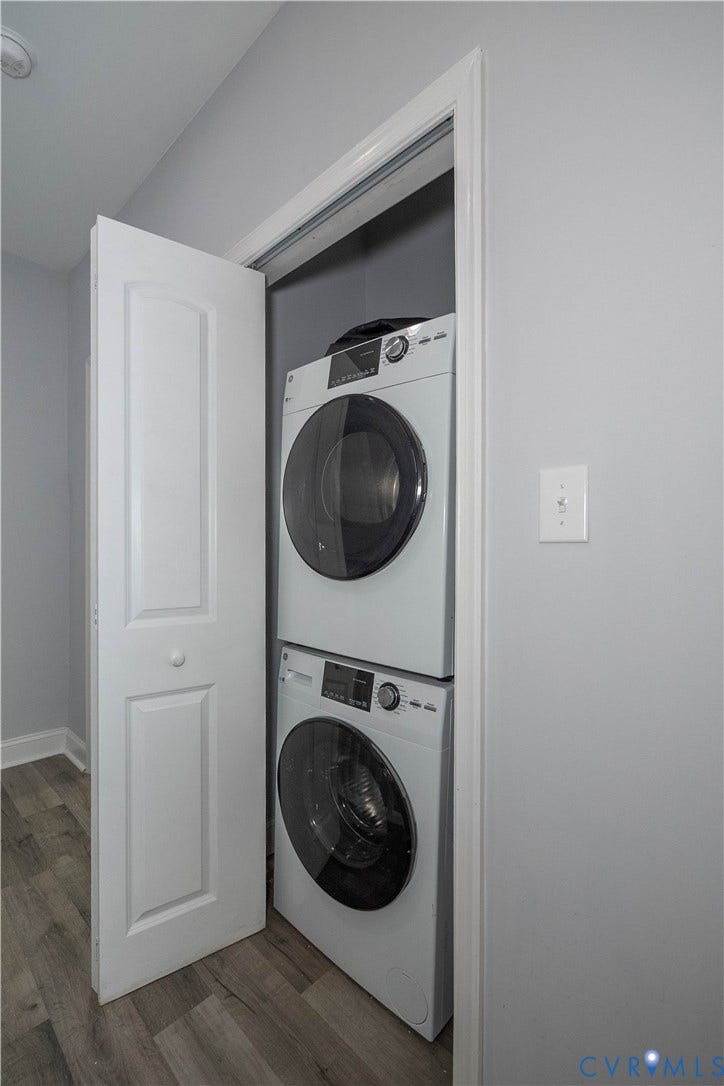 1209 N 22nd Street, Church Hill, Richmond, VA 23223 Dedicated laundry closet featuring a stacked washer and dryer unit