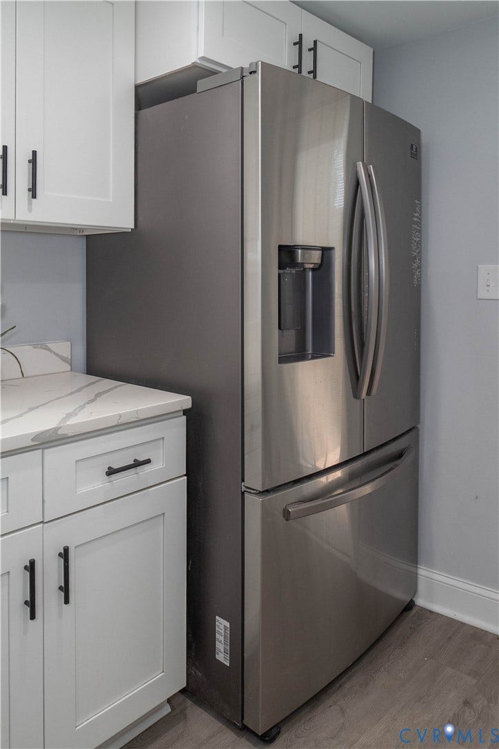 1209 N 22nd Street, Church Hill, Richmond, VA 23223 Stainless steel French-door refrigerator featuring an external ice and water dispenser