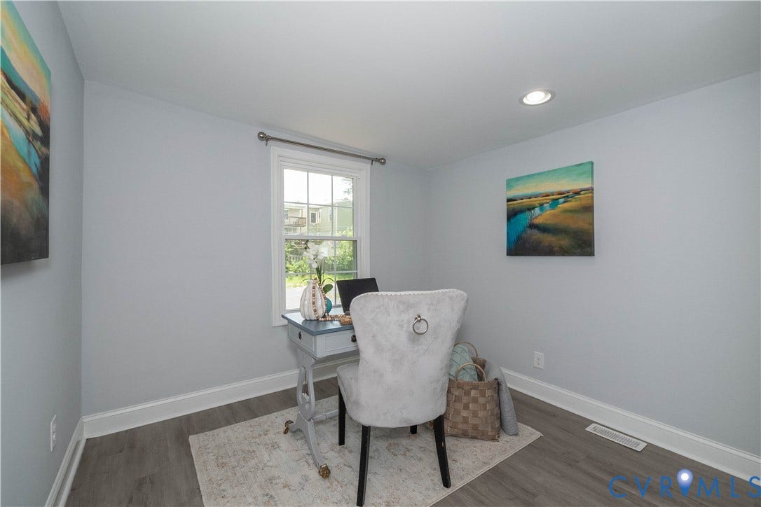 1209 N 22nd Street, Church Hill, Richmond, VA 23223 Room featuring wood-finish flooring, light gray wall paint, and white trim