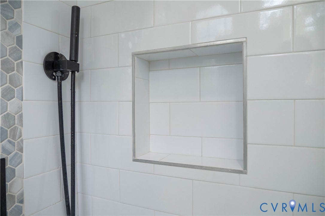 1209 N 22nd Street, Church Hill, Richmond, VA 23223 White subway tile shower surround with an integrated recessed niche