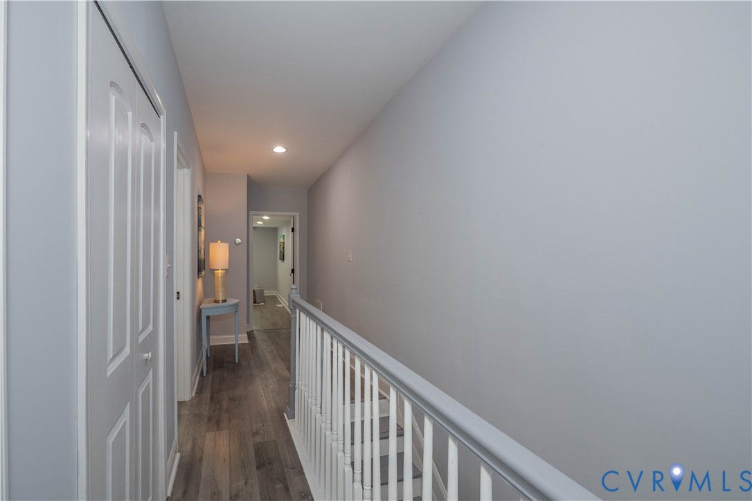 1209 N 22nd Street, Church Hill, Richmond, VA 23223 Hallway featuring wood-finish flooring, light gray walls, white trim, and recessed lighting