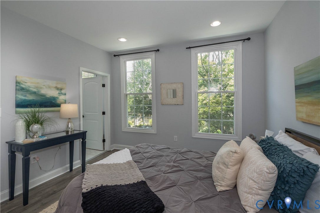 1209 N 22nd Street, Church Hill, Richmond, VA 23223 Bright room featuring two vertical windows, recessed lighting, and wood-finish flooring