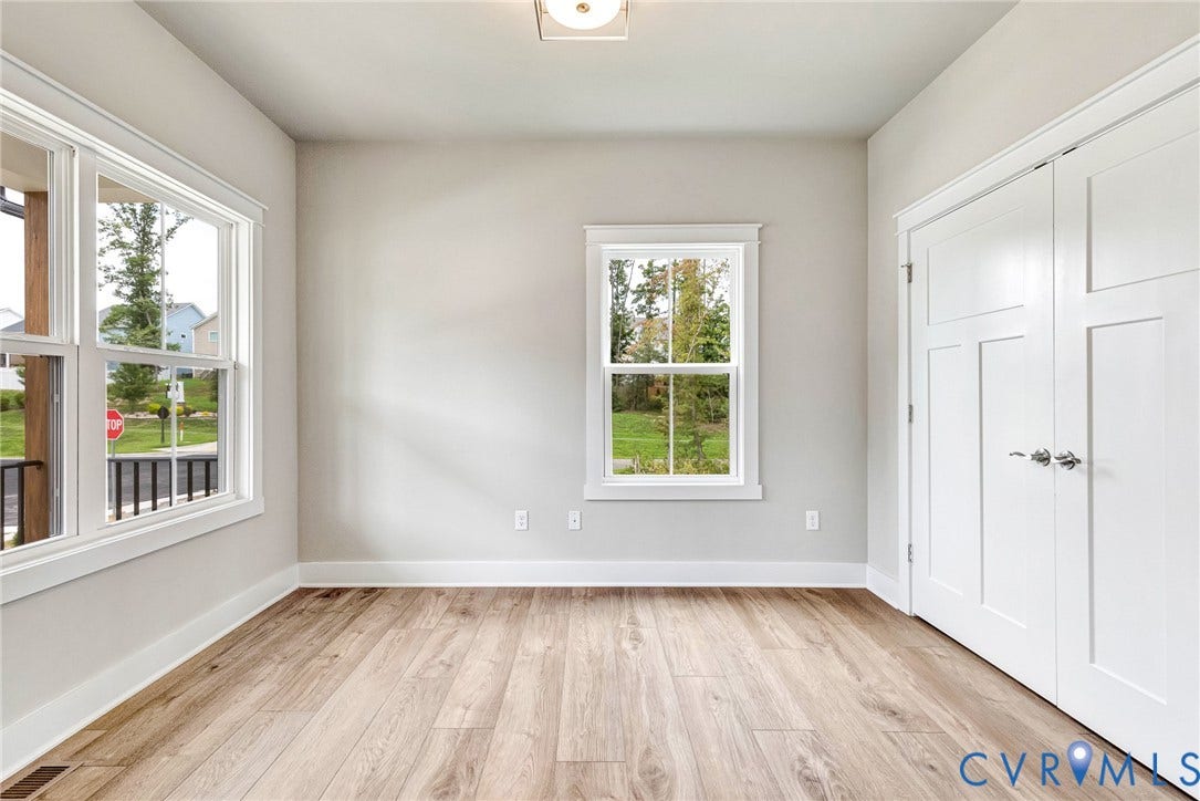 11101 Somerset Hill Drive, Somerset Hills, Glen Allen, VA 23059 Wood-finish flooring, white trim, recessed lighting, and a white paneled closet door