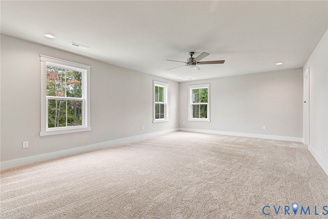 11101 Somerset Hill Drive, Somerset Hills, Glen Allen, VA 23059 Expansive room featuring light-toned carpeting, multiple windows, a ceiling fan, and recessed lighting