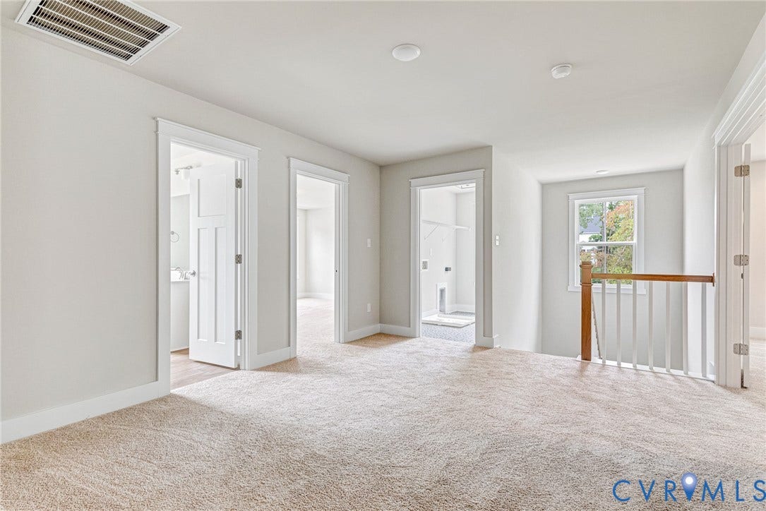 11101 Somerset Hill Drive, Somerset Hills, Glen Allen, VA 23059 Light-toned wall paint, recessed lighting, neutral carpet flooring, transom-style interior doors, and a wood and white spindle staircase railing