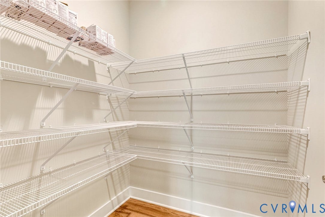11101 Somerset Hill Drive, Somerset Hills, Glen Allen, VA 23059 Wraparound wire shelving system with white wall finish and wood-finish flooring