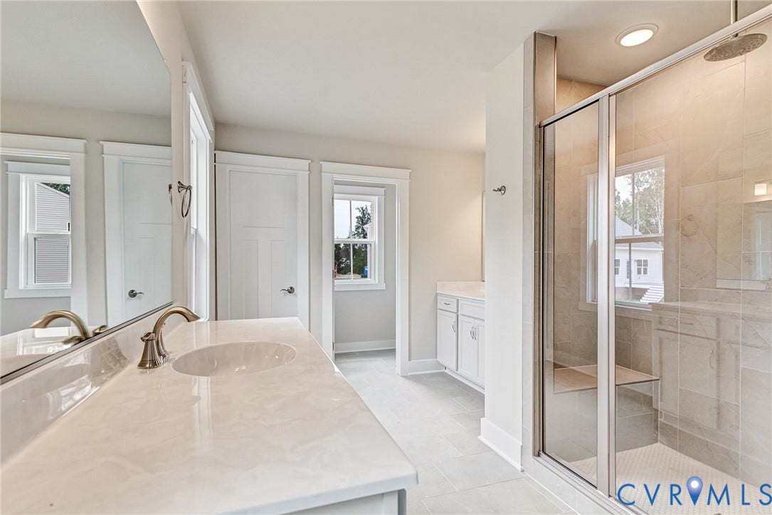 11101 Somerset Hill Drive, Somerset Hills, Glen Allen, VA 23059 Dual vanity with stone countertop, glass-enclosed shower, shower bench, and recessed lighting