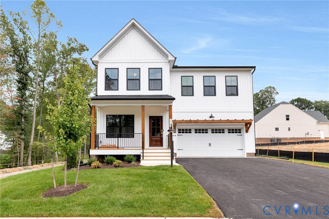 11101 Somerset Hill Drive, Somerset Hills, Glen Allen, VA 23059 Modern farmhouse exterior with white vertical siding, black-framed windows, and a covered porch