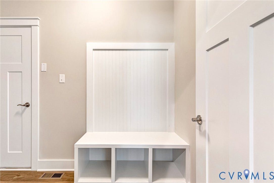 11101 Somerset Hill Drive, Somerset Hills, Glen Allen, VA 23059 Built-in bench with storage cubes, beadboard paneling, and wood-finish flooring