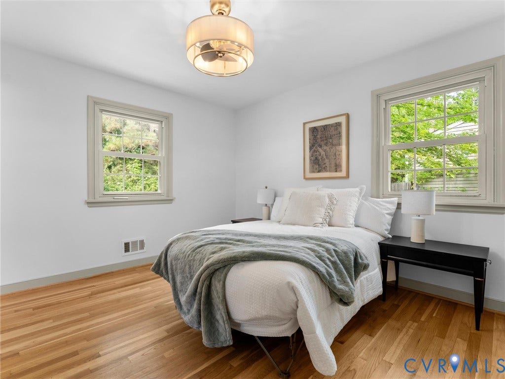 10400 Claybar Trail, Chesterfield, VA 23236 Hardwood flooring complements light-toned walls and trim throughout this bedroom