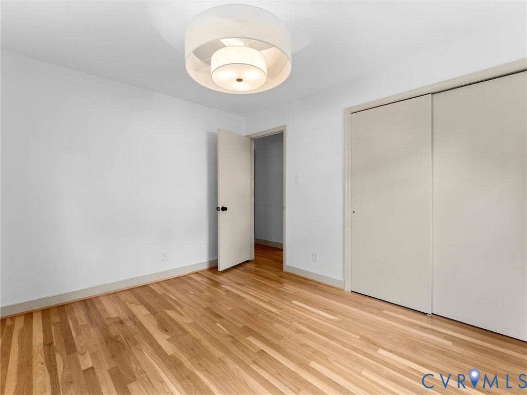 10400 Claybar Trail, Chesterfield, VA 23236 Light wood-finish flooring with white walls and baseboards