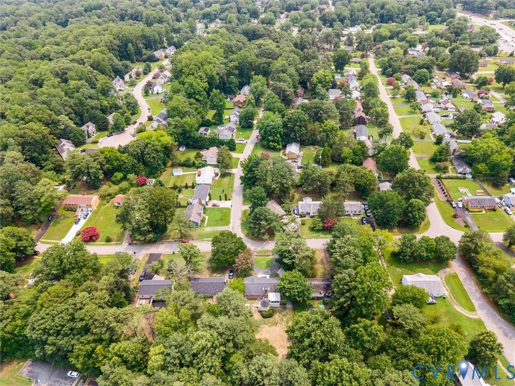 10400 Claybar Trail, Chesterfield, VA 23236 Aerial perspective showcasing a residential area with mature trees and established homes