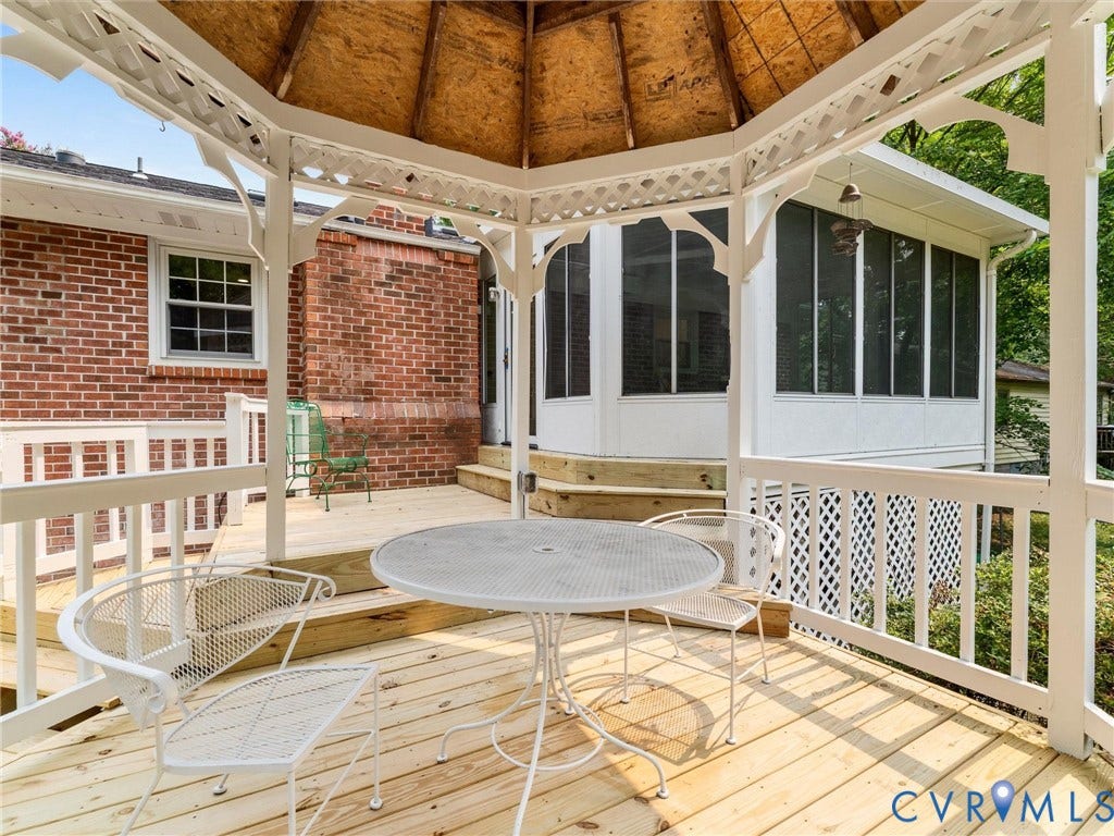 10400 Claybar Trail, Chesterfield, VA 23236 Expansive wood deck with a built-in gazebo featuring decorative lattice details
