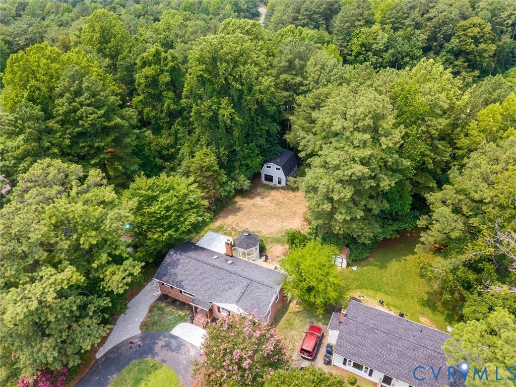 10400 Claybar Trail, Chesterfield, VA 23236 Expansive property featuring mature trees and lush green foliage