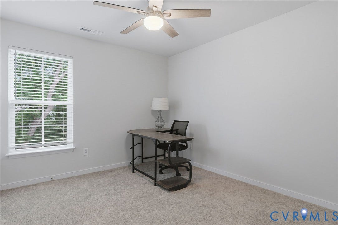 6544 Bolles Landing Court, Chester, VA 23831 Neutral tone walls complement the light-colored carpet flooring