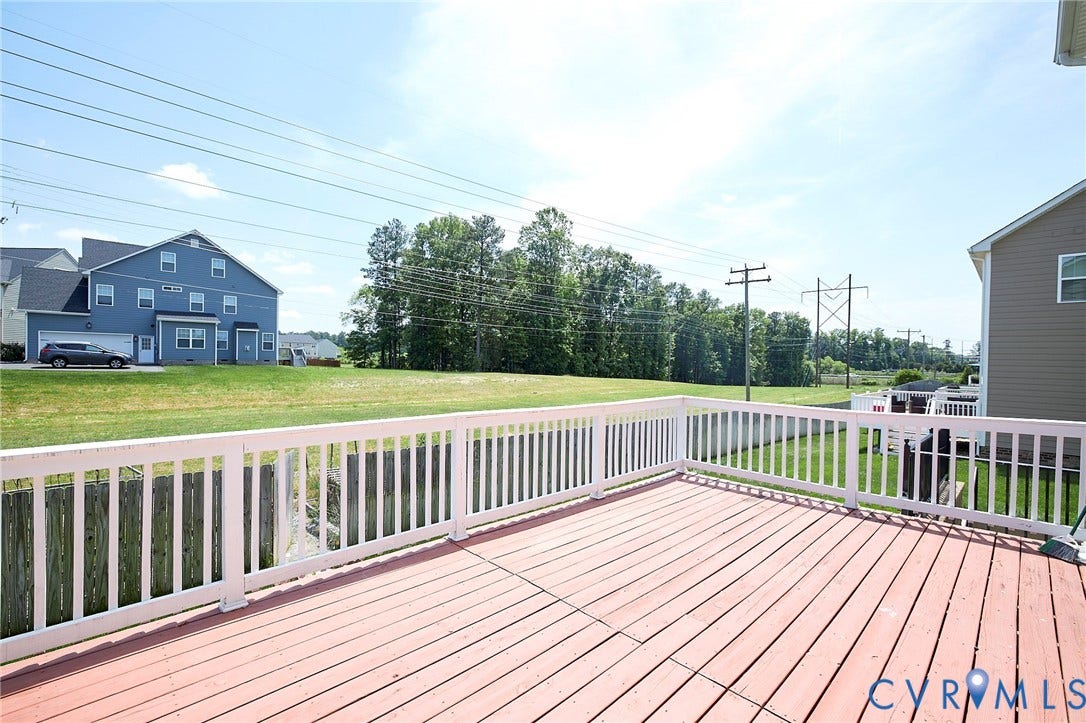 4535 Paxton Glen Court, 3W120, Glen Allen, VA 23059 Red-stained wood deck with white railings