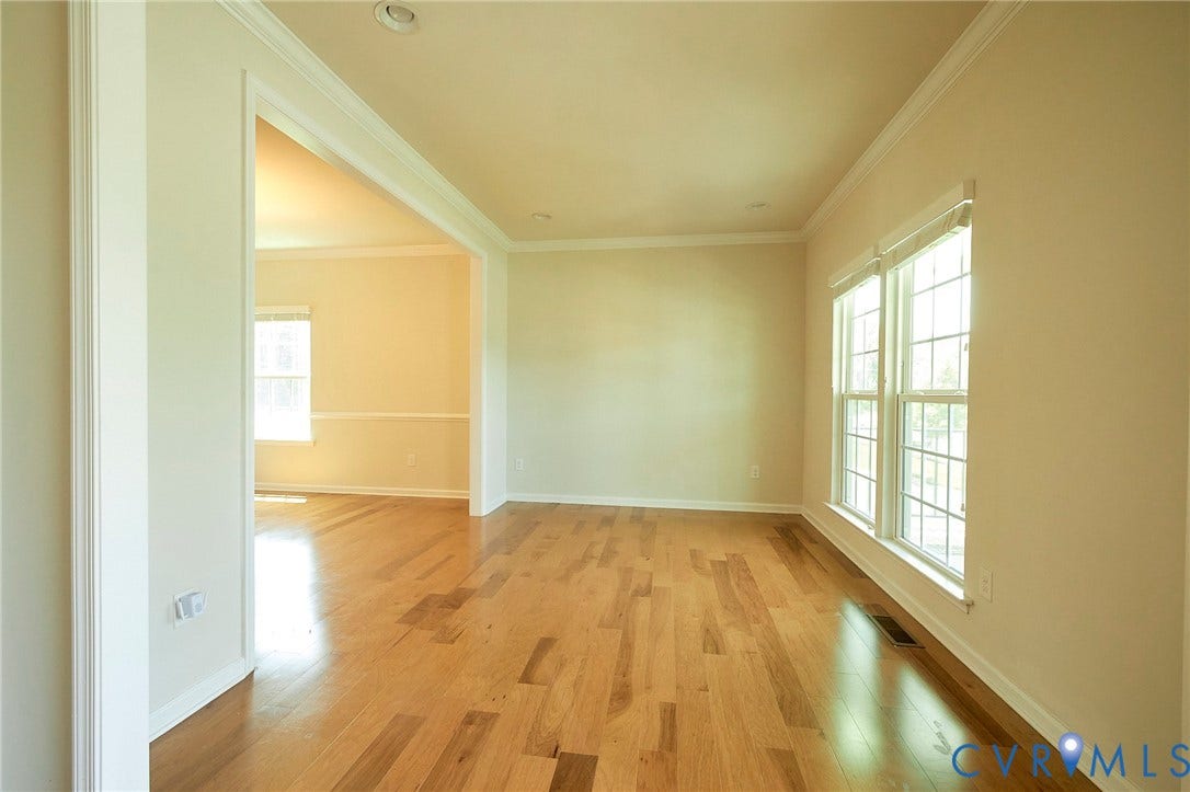 4535 Paxton Glen Court, 3W120, Glen Allen, VA 23059 Bright room featuring wood-finish flooring, white trim, recessed lighting, and a wide entryway
