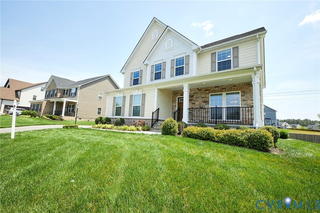 4535 Paxton Glen Court, 3W120, Glen Allen, VA 23059 Two-story residence featuring a covered front porch with stone veneer accents, white columns, and black railings