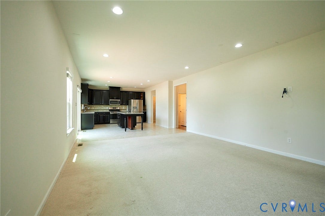 4535 Paxton Glen Court, 3W120, Glen Allen, VA 23059 Open-concept living area featuring light-toned carpeting and recessed lighting