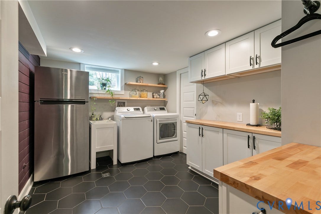 4549 Arrowhead Road, Stratford Hills, Richmond, VA 23235 The beautifully renovated laundry room offers loads of storage, a utility sink and fridge, as well as a utility closet to the right of the room.