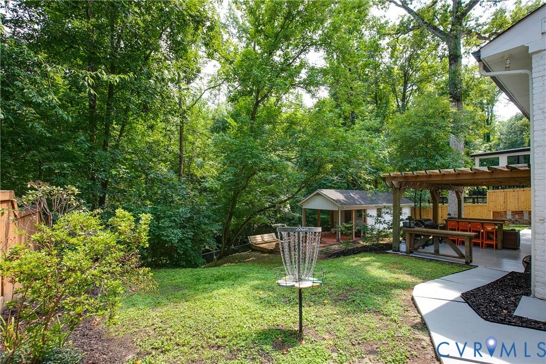 4549 Arrowhead Road, Stratford Hills, Richmond, VA 23235 Fun backyard setup is perfect for parties or unwinding.