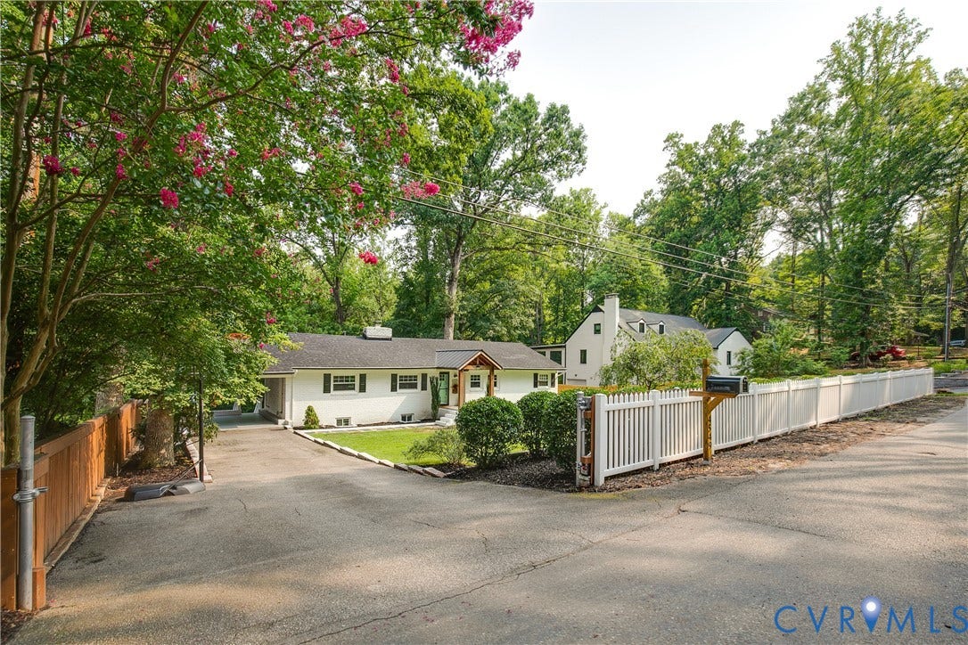 4549 Arrowhead Road, Stratford Hills, Richmond, VA 23235 The driveway widens at the entrance, allowing space to maneuver around another car.