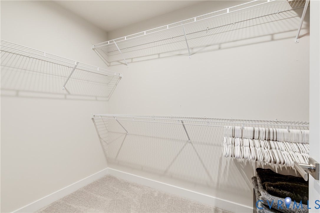 18301 Sagamore Drive, Hampton Pointe, Moseley, VA 23120 Walk-in closet featuring built-in wire shelving