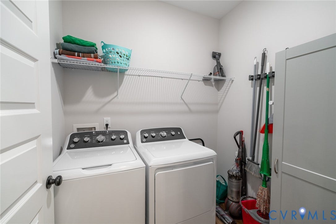 10508 Goosecross Way, Stag's Leap/ Stag's Trail, Hanover, VA 23116 Dedicated first floor laundry room off of kitchen featuring wire shelving, overhead storage, and white painted walls