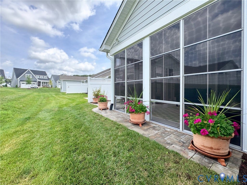 10508 Goosecross Way, Stag's Leap/ Stag's Trail, Hanover, VA 23116 Screened porch with light-colored siding and a paver patio