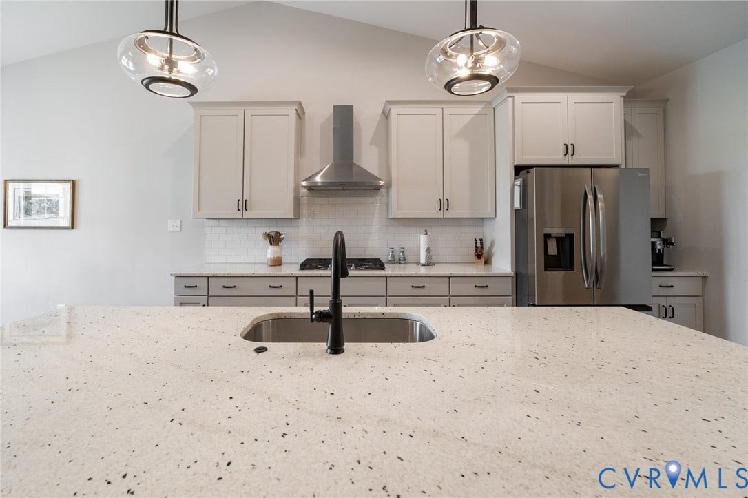 10508 Goosecross Way, Stag's Leap/ Stag's Trail, Hanover, VA 23116 Kitchen featuring a spacious island with an undermount sink and matte black faucet