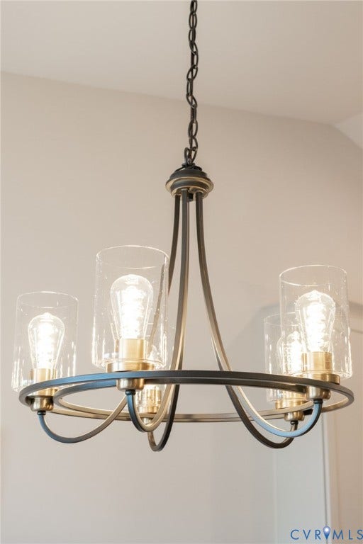 10508 Goosecross Way, Stag's Leap/ Stag's Trail, Hanover, VA 23116 Modern chandelier featuring a dark bronze finish and five clear seeded glass shades