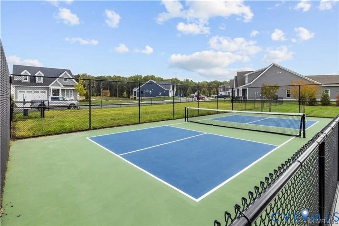 10508 Goosecross Way, Stag's Leap/ Stag's Trail, Hanover, VA 23116 Fenced outdoor pickleball courts with durable blue and green surfacing