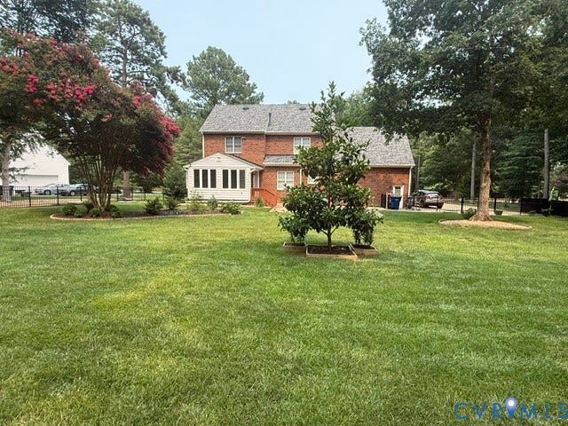 12124 Glen Kilchurn Drive, Chesterfield, VA 23838 Expansive green lawn with mature trees and a flowering crepe myrtle