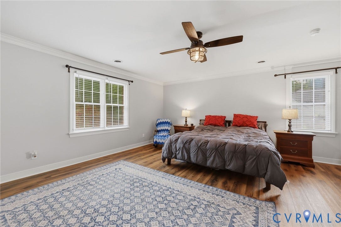 12124 Glen Kilchurn Drive, Chesterfield, VA 23838 Bedroom featuring wood-finish flooring, two large windows with blinds, a ceiling fan with integrated lighting, and crown molding