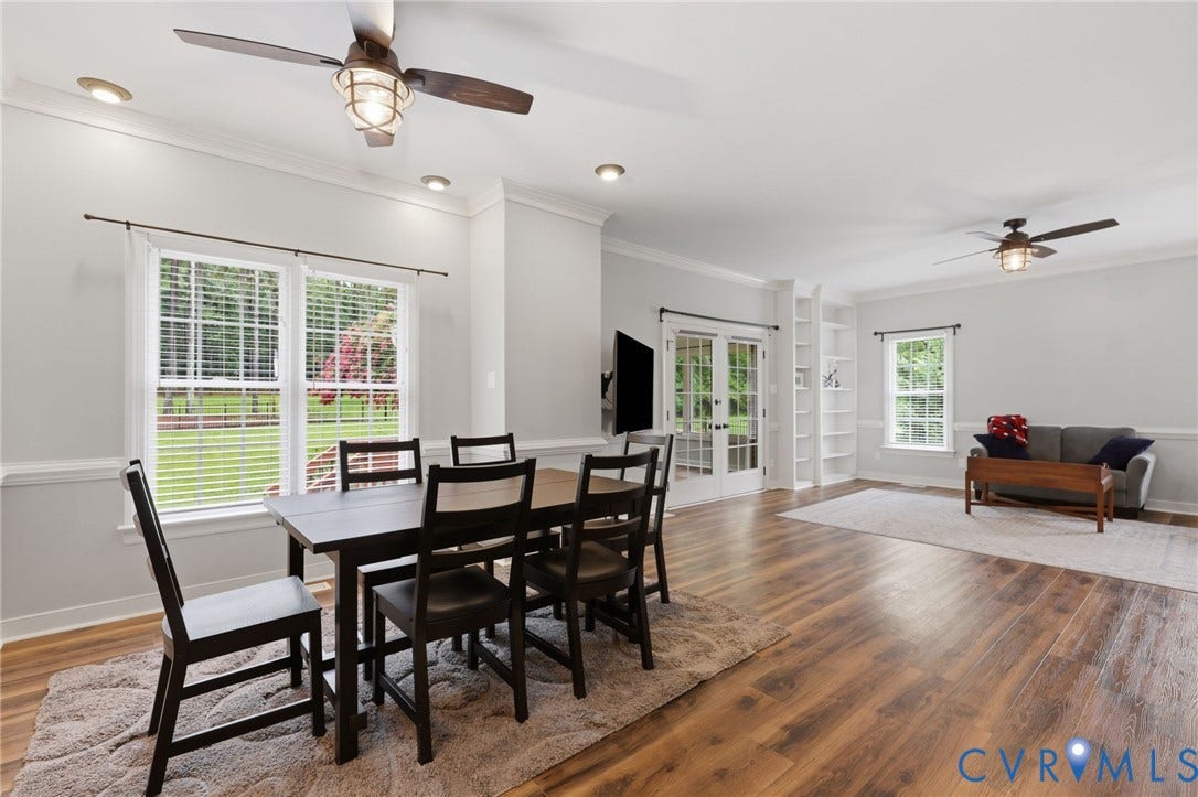 12124 Glen Kilchurn Drive, Chesterfield, VA 23838 Open-concept living space featuring wood-finish flooring, recessed lighting, and crown molding