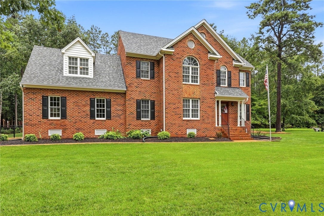12124 Glen Kilchurn Drive, Chesterfield, VA 23838 Brick exterior with a prominent arched window and a covered front entry