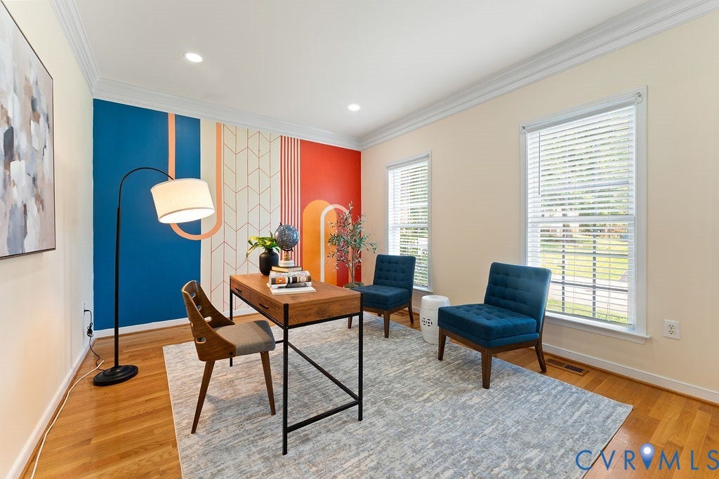 5316 Lemoore Drive, Glen Allen, VA 23059 Hardwood flooring complemented by a vibrant accent wall with geometric and abstract patterns
