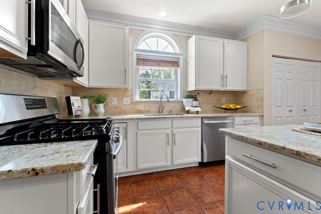 5316 Lemoore Drive, Glen Allen, VA 23059 Kitchen featuring white cabinetry, stainless steel appliances, granite countertops, and tiled flooring