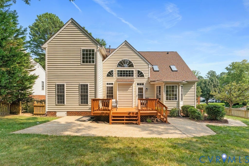 5316 Lemoore Drive, Glen Allen, VA 23059 Rear exterior featuring a wooden deck with railing, a concrete patio, and a dormer window