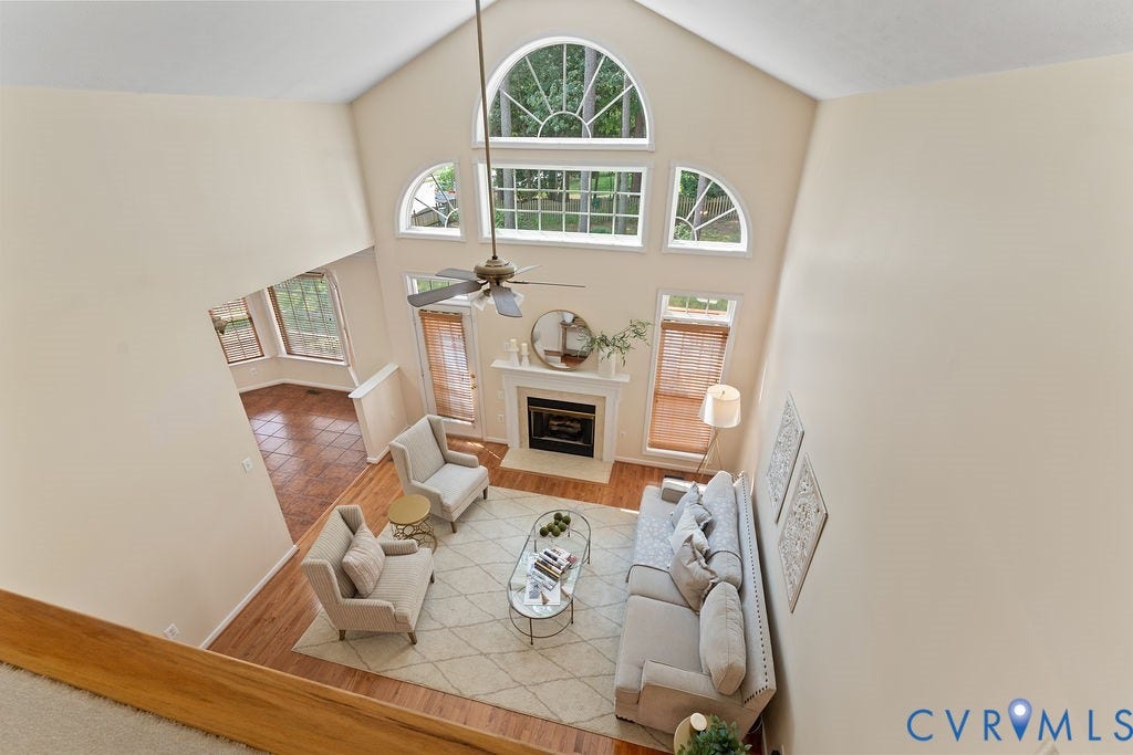 5316 Lemoore Drive, Glen Allen, VA 23059 Soaring vaulted ceiling with a ceiling fan, featuring multiple arched and rectangular windows