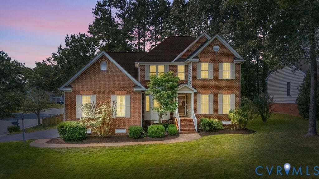 5316 Lemoore Drive, Glen Allen, VA 23059 Brick facade residence featuring multiple dormer windows, a covered front entry, and mature landscaping