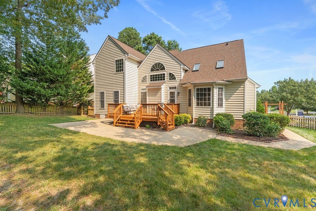 5316 Lemoore Drive, Glen Allen, VA 23059 Rear exterior featuring a multi-level wooden deck, concrete patio, and sloped lawn
