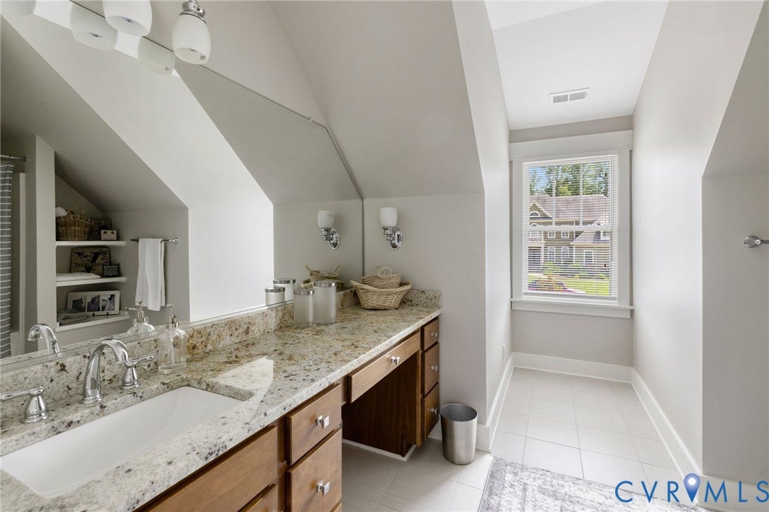15918 Drumone Road, Hallsley, Midlothian, VA 23112 Spacious vanity with light-toned countertop, undermount sink, and wood cabinetry