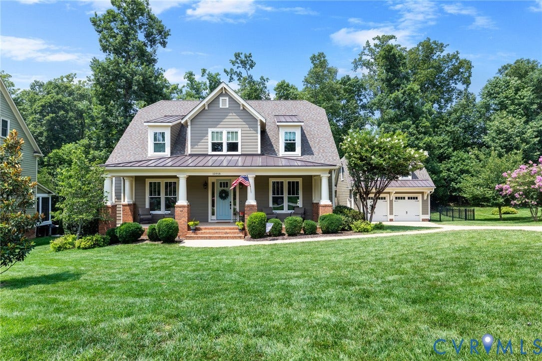 15918 Drumone Road, Hallsley, Midlothian, VA 23112 Craftsman-style home featuring a covered front porch with columns, brick accents, and a light blue front door