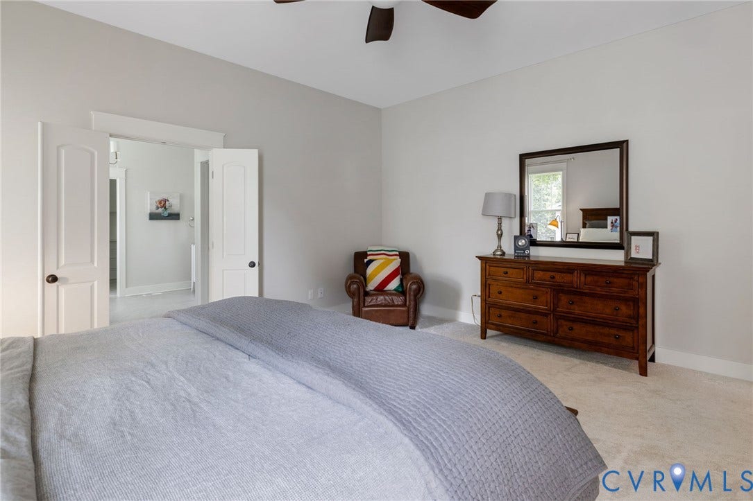 15918 Drumone Road, Hallsley, Midlothian, VA 23112 Carpeted bedroom featuring neutral wall tones, a ceiling fan, and white trim