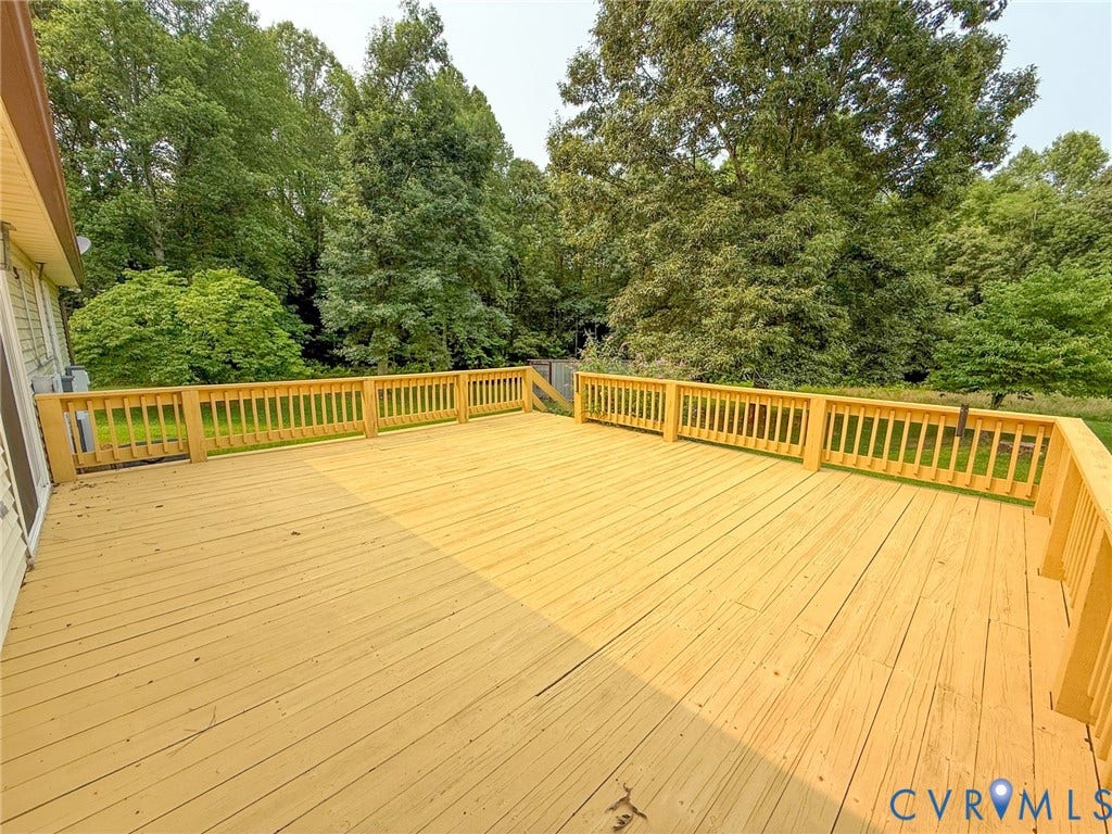 6688 Old Buckingham Road, Powhatan, VA 23139 Expansive outdoor deck featuring wood-finish flooring and a full perimeter railing system